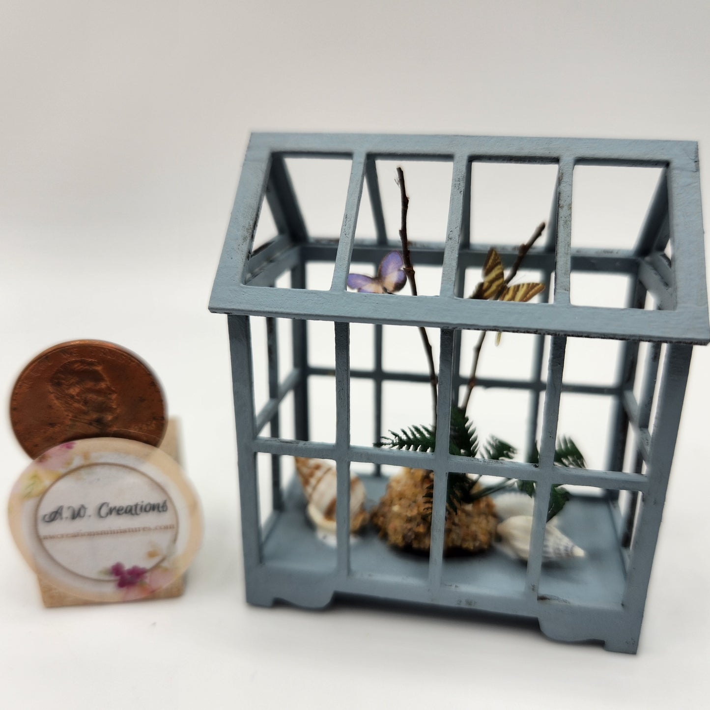 Blue Terrarium with Butterflies