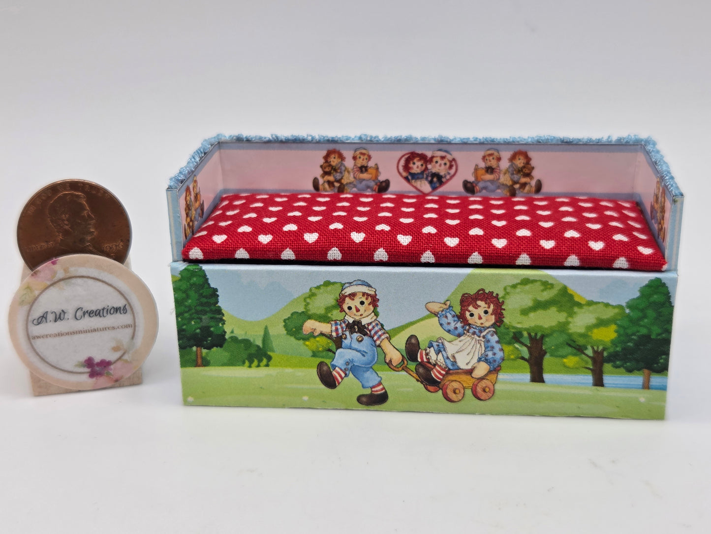 Toy box - raggedy doll tree scape