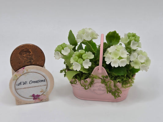 White Hydrangea in Pink Basket