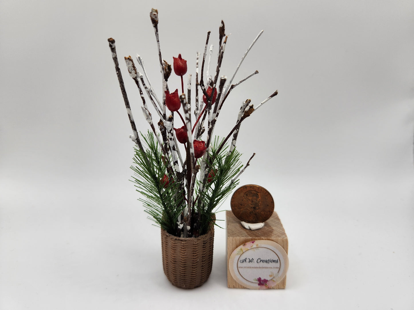 Evergreen & Birch arrangement in tall basket
