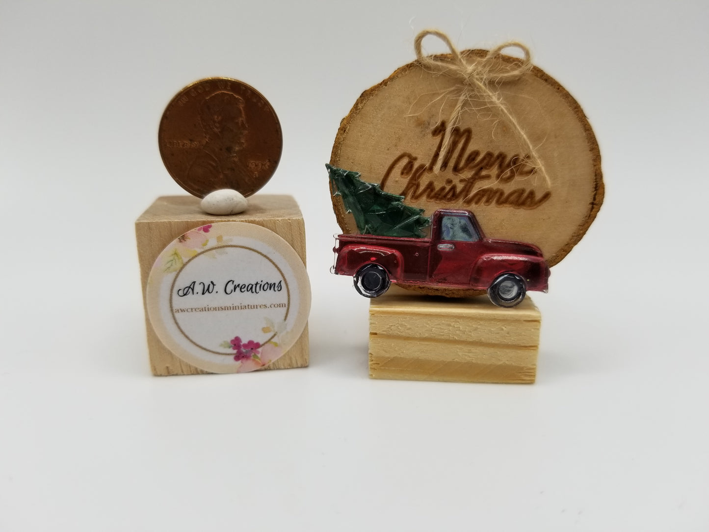 Merry Christmas sign with pickup truck