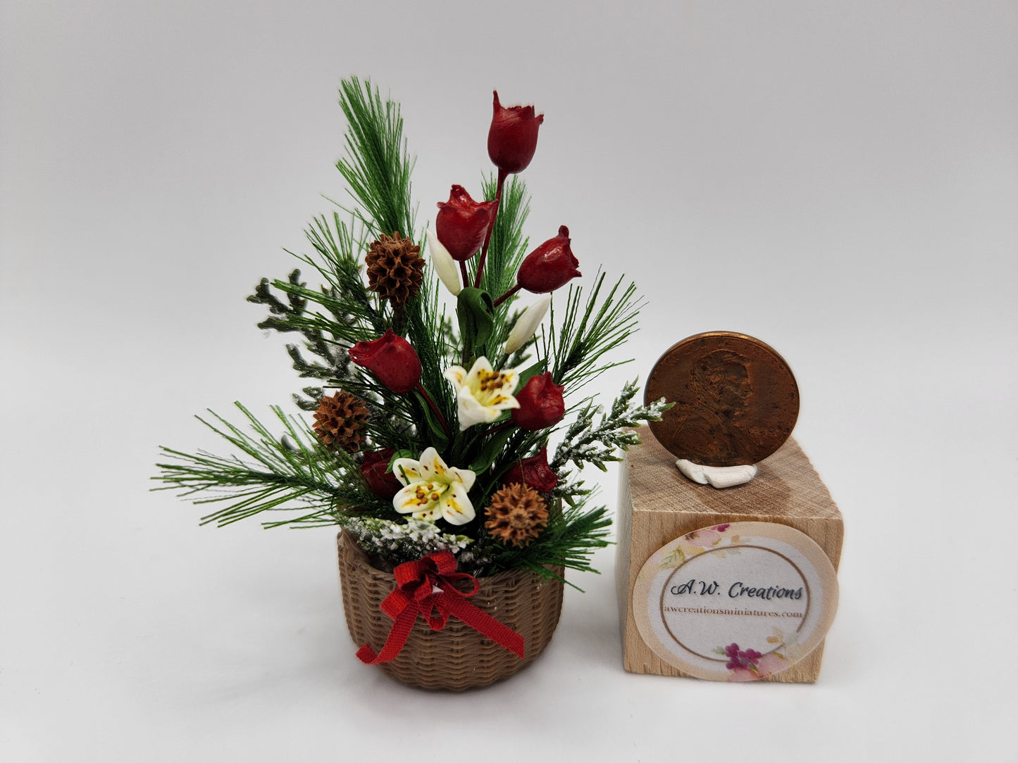 Evergreen arrangement in low basket