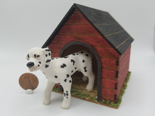 Dalmatian and dog house