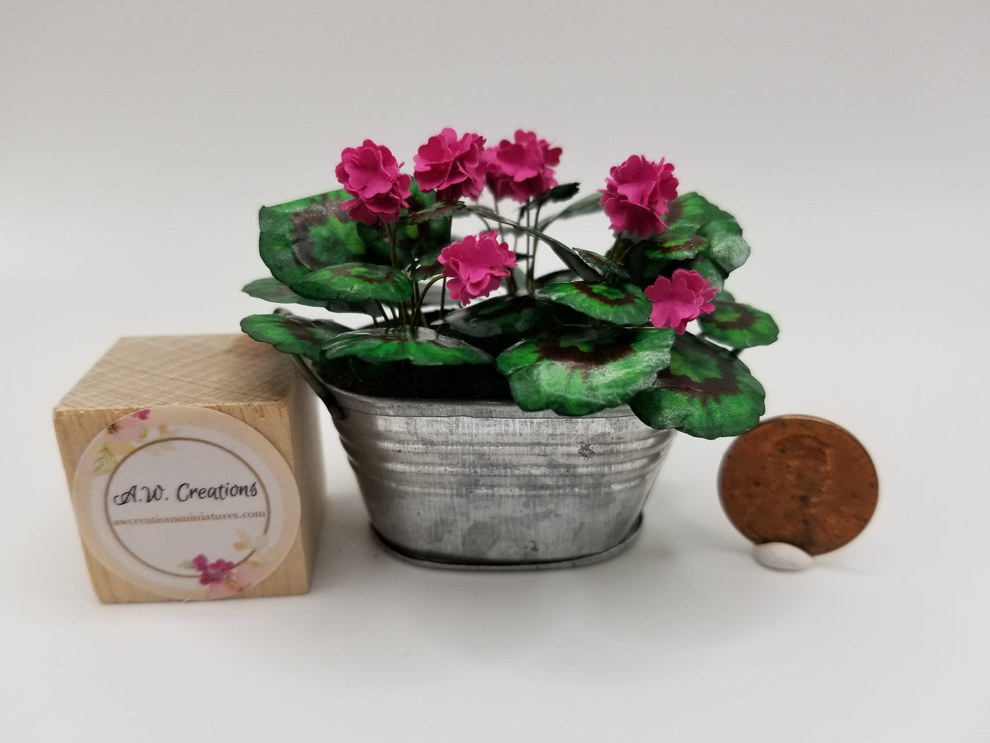 Planter - hot pink geranium in tin tub