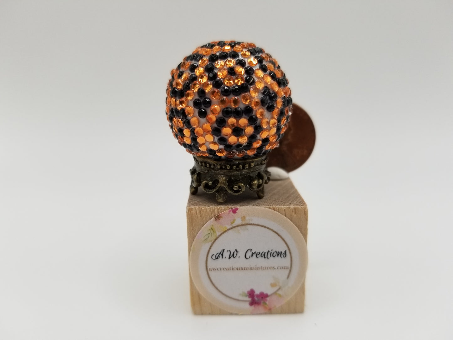 Jeweled ball - orange and black