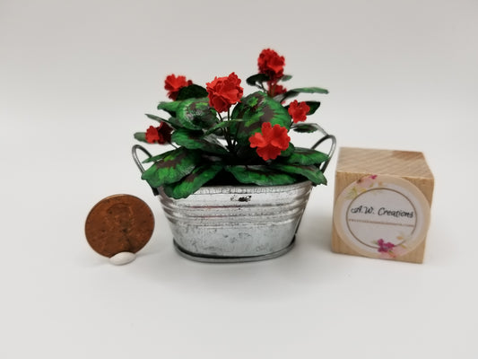 Planter - red geranium in tin tub